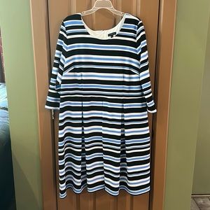 Adorable striped dress with pleats.  Lightweight fabric with waffle texture.